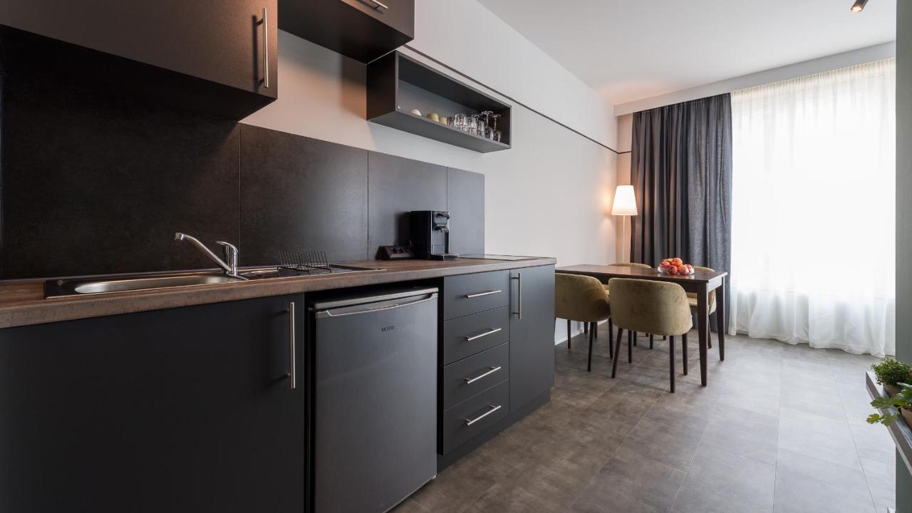Metropol Apartments & Suites ทือบิงเงิน ภายนอก รูปภาพ